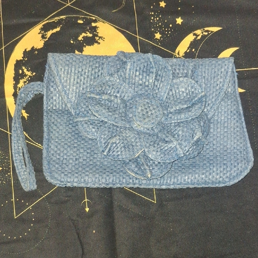 New Direction Blue Woven Clutch with Floral Accent